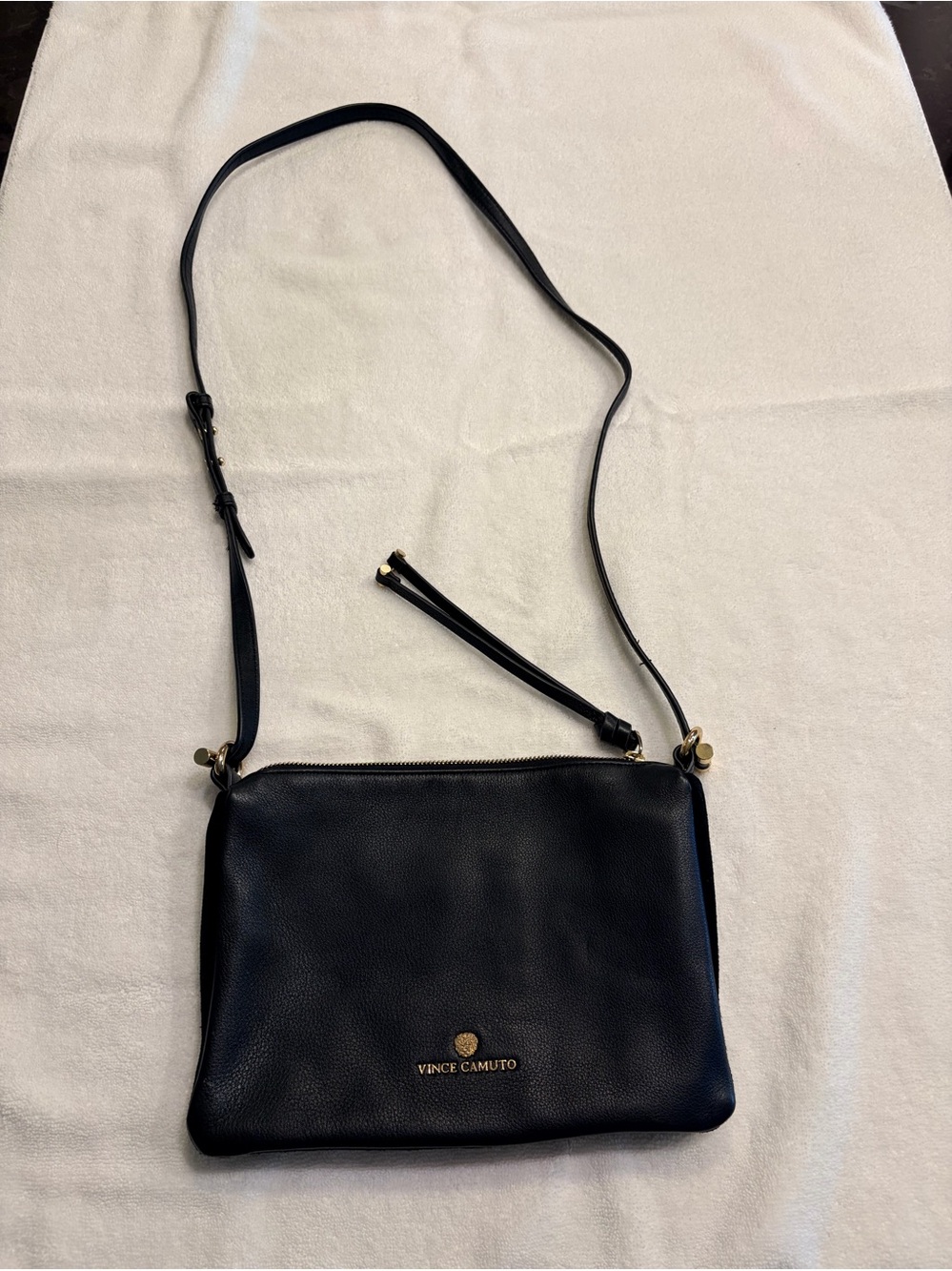 The Vince Camuto Veda Crossbody Bag in black leather and suede w/ gold hardware